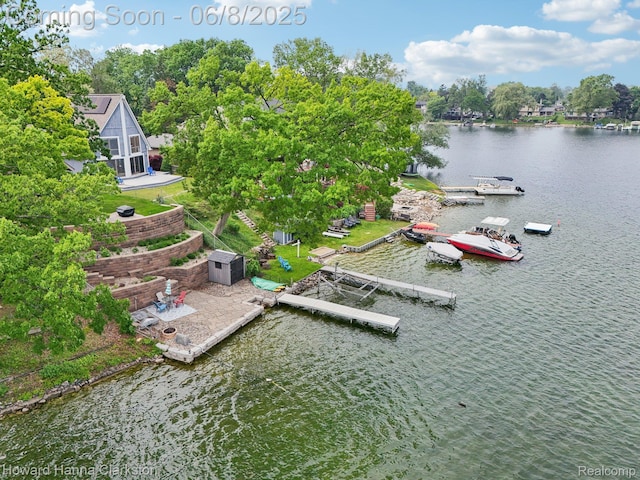 2734 Silverside Rd, Waterford, MI 48328 - aerial view of a large body of water and a tree filled landscape