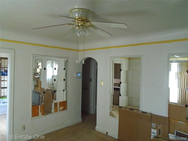 17127 Griggs St, Detroit, MI 48221 - spare room with arched walkways and ceiling fan