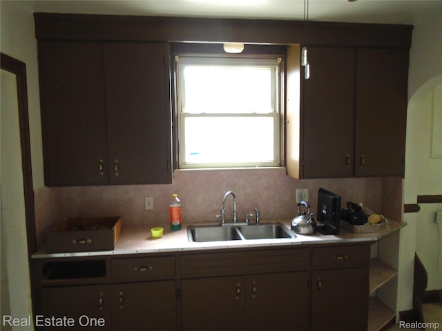 17127 Griggs St, Detroit, MI 48221 - kitchen featuring a sink and light countertops