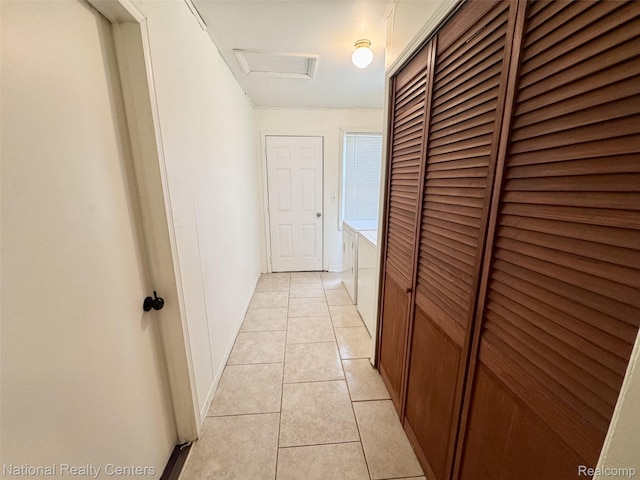 5689 Cornell St, Dearborn Heights, MI 48125 - hallway featuring attic access and light tile patterned flooring