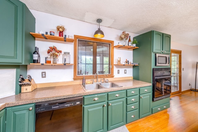 4300 Holton-Duck Lake Rd, Twin Lake, MI 49457 - kitchen with open shelves, black appliances, a sink, a textured ceiling, and light wood-type flooring