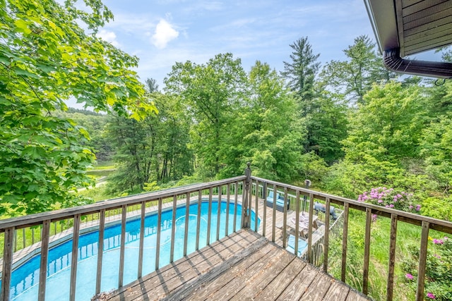 4300 Holton-Duck Lake Rd, Twin Lake, MI 49457 - wooden terrace featuring an outdoor pool