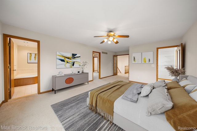 4070 Greenbriar Ct, Rochester, MI 48306 - carpeted bedroom with baseboards, connected bathroom, and ceiling fan