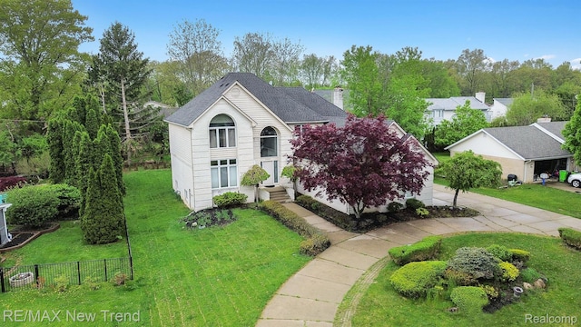 2337 Horseshoe Dr, West Bloomfield, MI 48322 - traditional-style house featuring driveway, a shingled roof, and a chimney