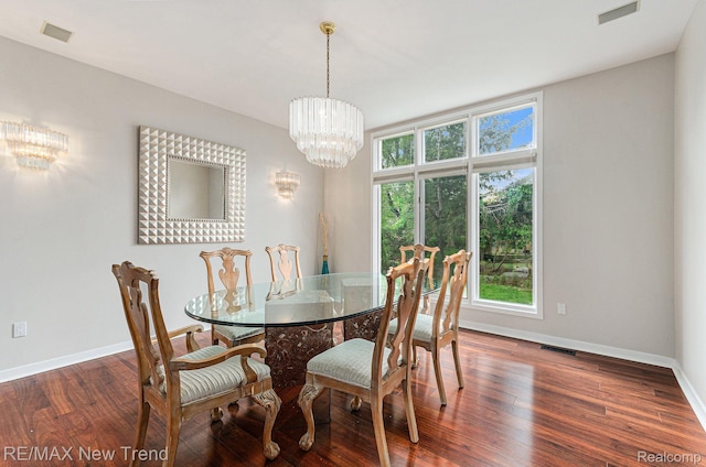 2337 Horseshoe Dr, West Bloomfield, MI 48322 - dining space featuring a chandelier, baseboards, and wood finished floors