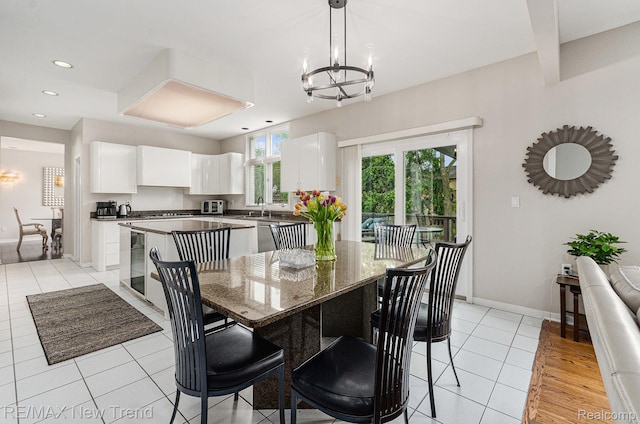 2337 Horseshoe Dr, West Bloomfield, MI 48322 - dining space with a chandelier, light tile patterned floors, recessed lighting, and baseboards
