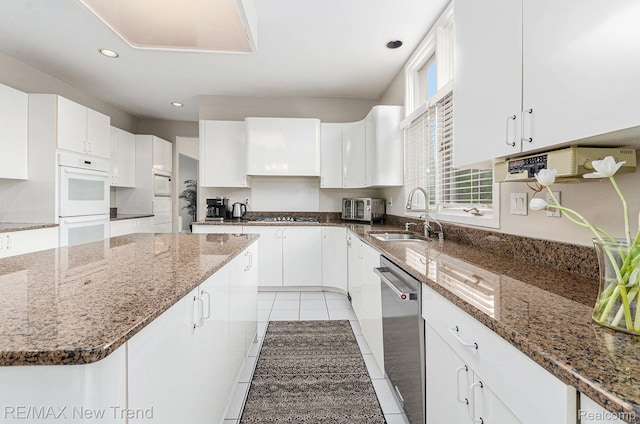 2337 Horseshoe Dr, West Bloomfield, MI 48322 - kitchen featuring a sink, white appliances, white cabinetry, and recessed lighting