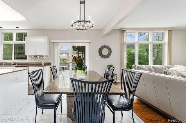 2337 Horseshoe Dr, West Bloomfield, MI 48322 - dining room featuring light tile patterned flooring, a chandelier, and recessed lighting