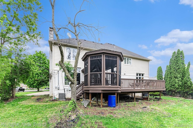 2337 Horseshoe Dr, West Bloomfield, MI 48322 - back of house with a sunroom, a chimney, a deck, a yard, and central AC
