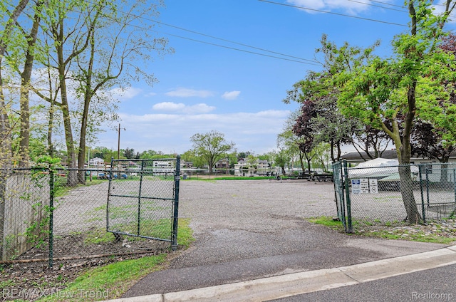 2337 Horseshoe Dr, West Bloomfield, MI 48322 - view of asphalt driveway with a gate and a gated entry