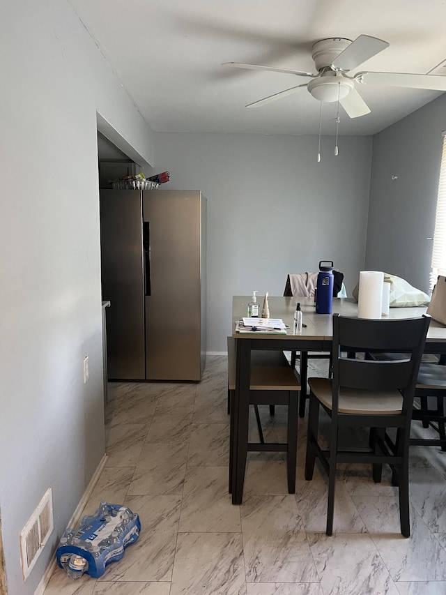 13990 Lauder St, Detroit, MI 48227 - dining area with a ceiling fan, light marble finish flooring, and an office area