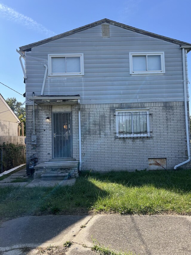 13990 Lauder St, Detroit, MI 48227 - traditional-style house featuring brick siding