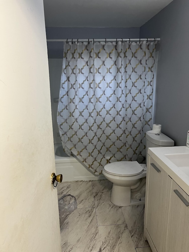 13990 Lauder St, Detroit, MI 48227 - bathroom with vanity, toilet, marble finish floors, and shower / bath combination with curtain