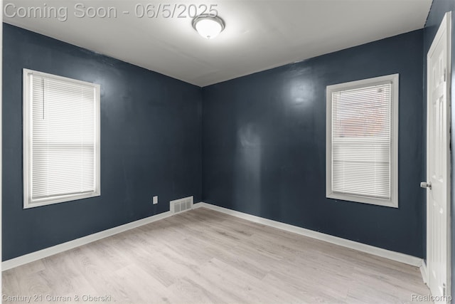 16509 Woodingham Dr, Detroit, MI 48221 - spare room with wood finished floors and baseboards