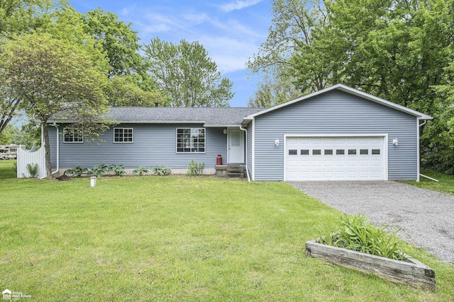 10207 Frances Rd, Flushing, MI 48433 - ranch-style house with driveway, an attached garage, a front lawn, and a shingled roof