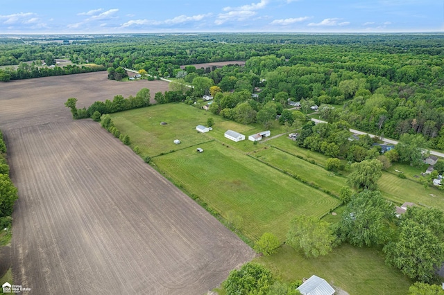 10207 Frances Rd, Flushing, MI 48433 - aerial view of property and surrounding area featuring a heavily wooded area and rural landscape