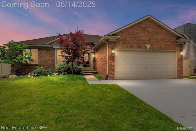 52657 Creekside Dr, Chesterfield, MI 48047 - view of front facade featuring brick siding, concrete driveway, a yard, an attached garage, and roof with shingles