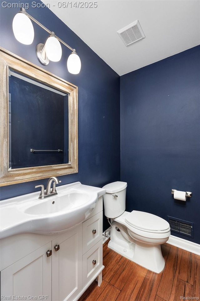 52657 Creekside Dr, Chesterfield, MI 48047 - half bathroom featuring vanity and wood finished floors