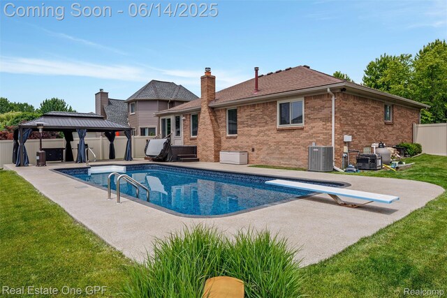 52657 Creekside Dr, Chesterfield, MI 48047 - view of swimming pool with a gazebo, a patio area, and a diving board