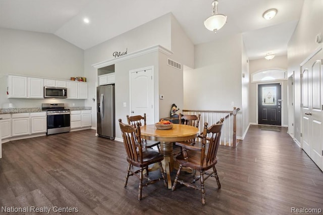 251 Devonshire Dr Unit 1, Lapeer, MI 48446 - dining space with high vaulted ceiling, dark wood-style flooring, and baseboards