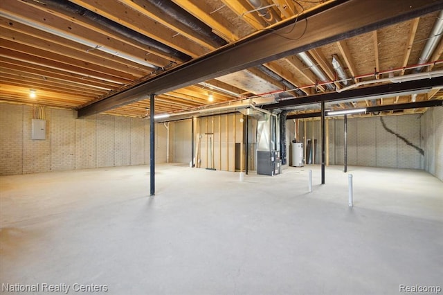 251 Devonshire Dr Unit 1, Lapeer, MI 48446 - unfinished basement with water heater, electric panel, and heating unit