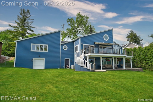 7457 Haviland Beach Dr, Argentine, MI 48451 - rear view of house featuring a wooden deck, stairway, and a lawn