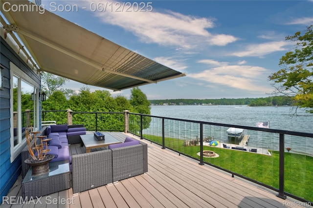 7457 Haviland Beach Dr, Argentine, MI 48451 - wooden terrace with an outdoor hangout area, a water view, and a lawn
