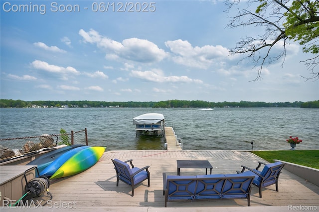 7457 Haviland Beach Dr, Argentine, MI 48451 - dock featuring a water view and boat lift