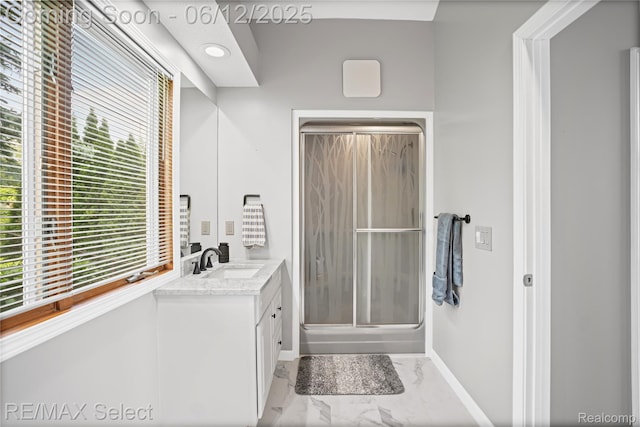 7457 Haviland Beach Dr, Argentine, MI 48451 - full bathroom featuring marble look tiles, vanity, a shower stall, baseboards, and recessed lighting