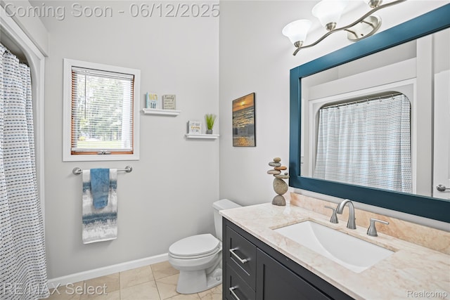 7457 Haviland Beach Dr, Argentine, MI 48451 - full bath featuring vanity, toilet, a chandelier, baseboards, and tile patterned flooring