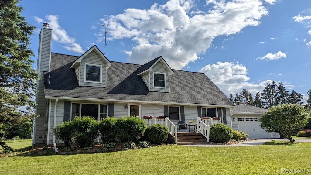 9753 W Coon Lake Rd, Webberville, MI 48892 - cape cod house featuring a front lawn, an attached garage, a chimney, and roof with shingles