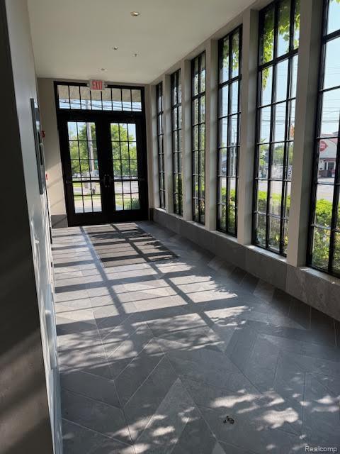 804 N Main St Unit 2A, Rochester, MI 48307 - unfurnished sunroom with french doors