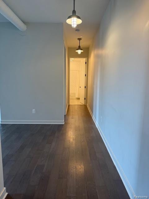 804 N Main St Unit 2A, Rochester, MI 48307 - hallway featuring dark wood finished floors and baseboards
