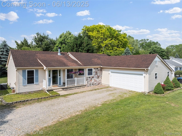 8907 Mccoll Side Rd, Brighton, MI 48116 - ranch-style house with driveway, a porch, a front yard, an attached garage, and roof with shingles