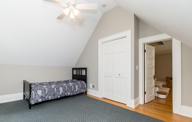 2430 Geddes Ave, Ann Arbor, MI 48104 - bedroom with wood finished floors, lofted ceiling, a closet, and a ceiling fan