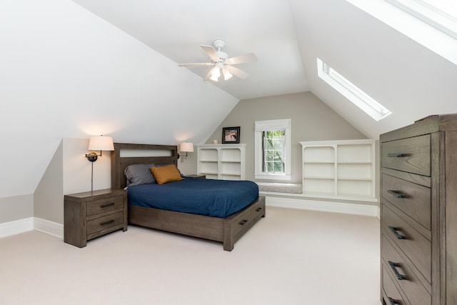 2430 Geddes Ave, Ann Arbor, MI 48104 - carpeted bedroom featuring a skylight, vaulted ceiling, and a ceiling fan
