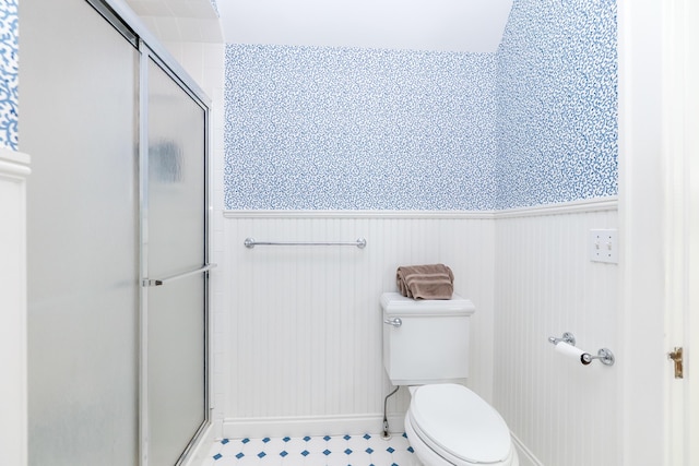 2430 Geddes Ave, Ann Arbor, MI 48104 - full bath with a stall shower, toilet, and a wainscoted wall