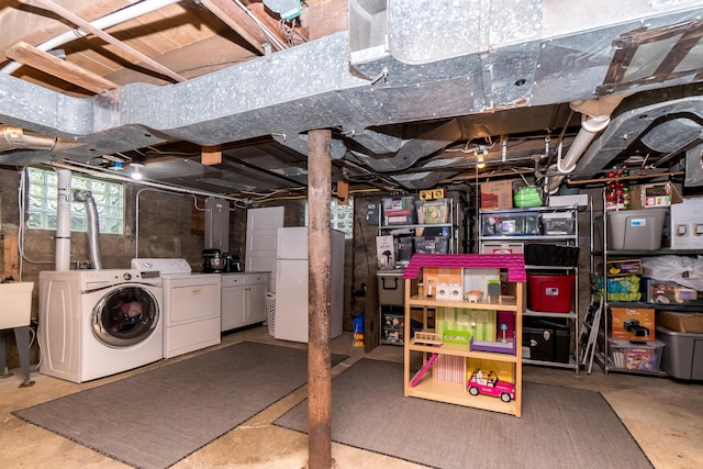 2430 Geddes Ave, Ann Arbor, MI 48104 - basement with freestanding refrigerator and washing machine and dryer