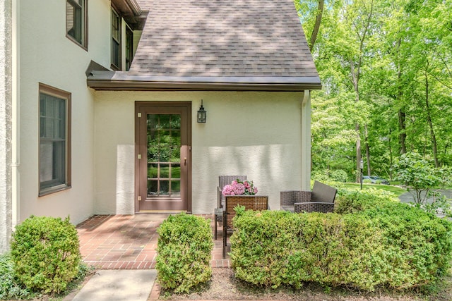 2430 Geddes Ave, Ann Arbor, MI 48104 - entrance to property with a shingled roof and stucco siding