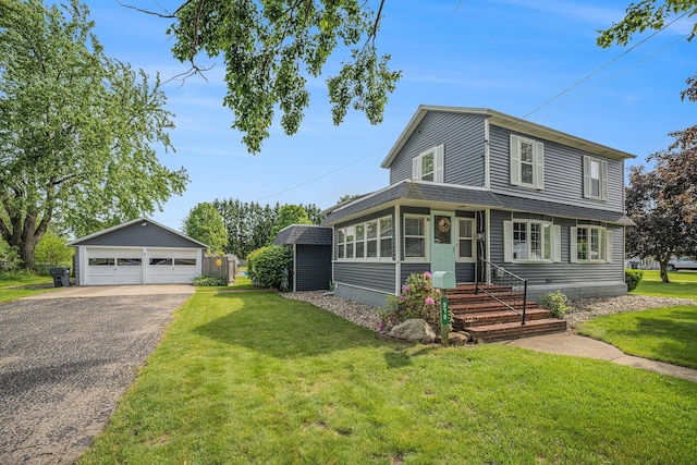 319 Washington St, Otsego, MI 49078 - view of front facade with an outdoor structure, a garage, a front lawn, entry steps, and a shingled roof