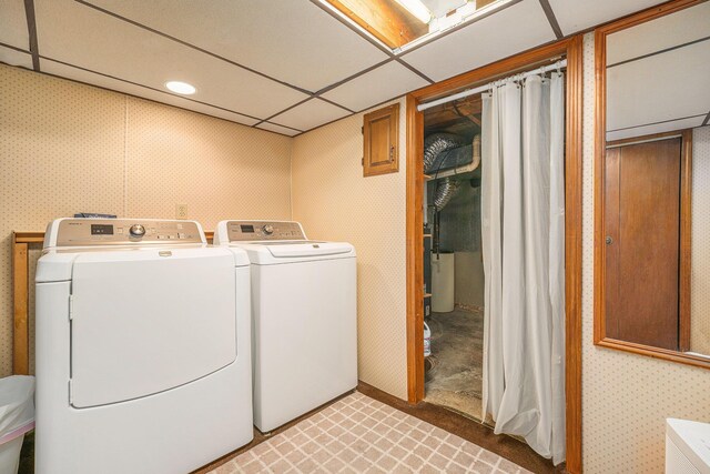 319 Washington St, Otsego, MI 49078 - washroom featuring washing machine and dryer and wallpapered walls