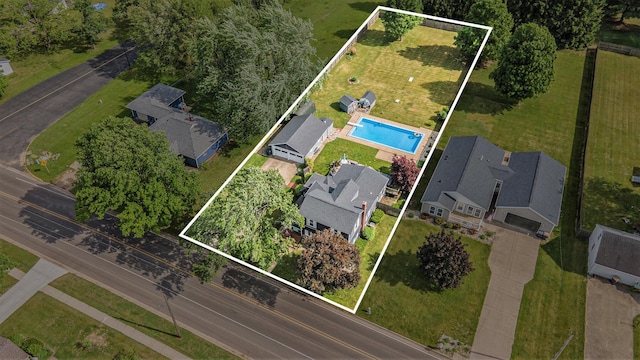 319 Washington St, Otsego, MI 49078 - aerial view of property and surrounding area with a pool area and property boundaries highlighted