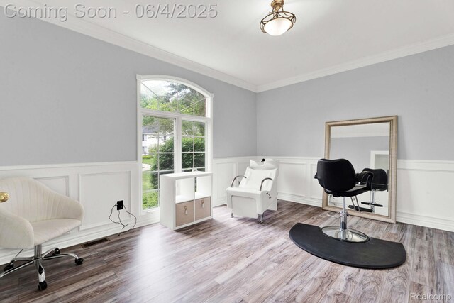 50565 Otter Creek Dr, Shelby Twp, MI 48317 - home office featuring a wainscoted wall, crown molding, wood finished floors, and a decorative wall