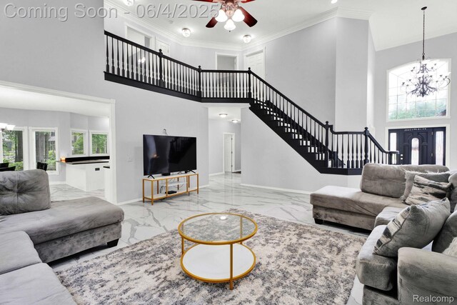 50565 Otter Creek Dr, Shelby Twp, MI 48317 - living room featuring a chandelier, marble tiled flooring, a high ceiling, stairway, and baseboards