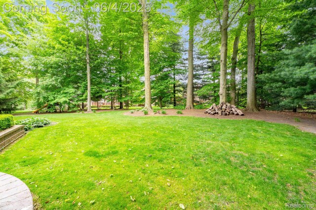 50565 Otter Creek Dr, Shelby Twp, MI 48317 - view of green lawn featuring a playground
