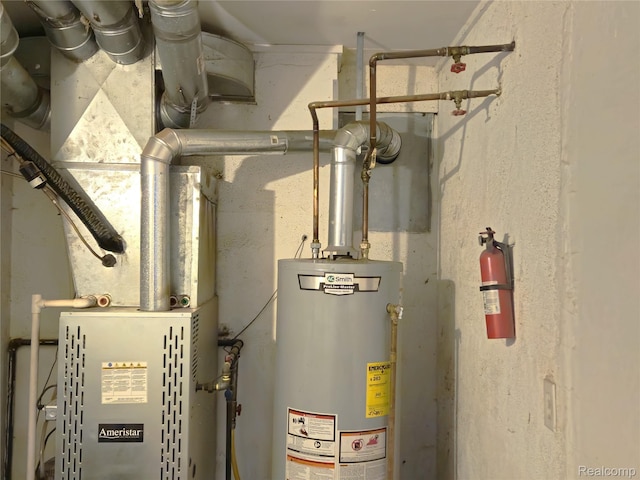 22189 Albion Ave, Farmington Hills, MI 48336 - utility room featuring water heater and heating unit