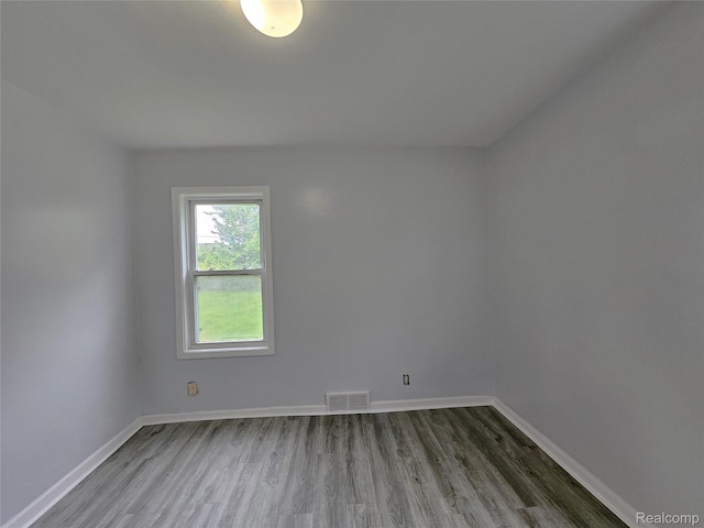 22189 Albion Ave, Farmington Hills, MI 48336 - spare room with wood finished floors and baseboards