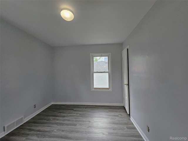 22189 Albion Ave, Farmington Hills, MI 48336 - empty room with wood finished floors and baseboards