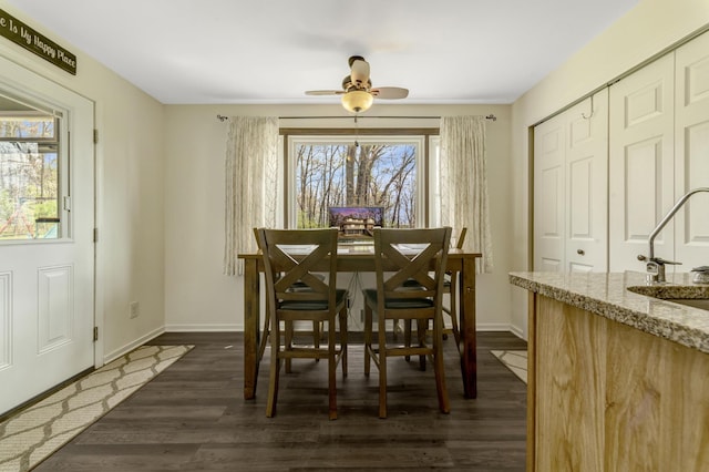 175 Templar Ave, Pinckney, MI 48169 - dining room with baseboards, dark wood finished floors, and a ceiling fan