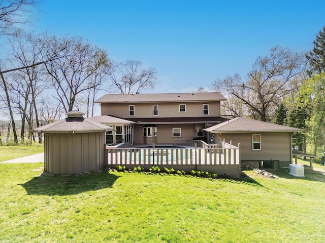 175 Templar Ave, Pinckney, MI 48169 - back of house with a lawn and a wooden deck